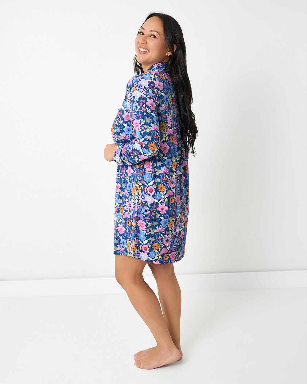 Side view of woman wearing the Dusk Blooms Women's Long Sleeve Sleep Shirt