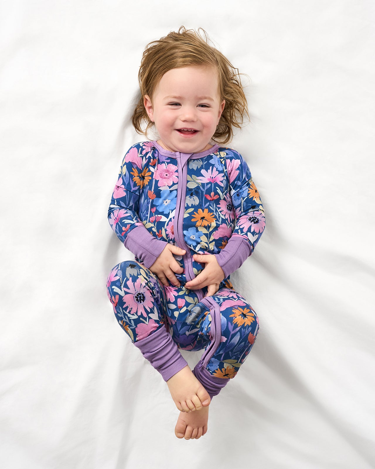 Aerial view of child wearing the Dusk Blooms Zippy