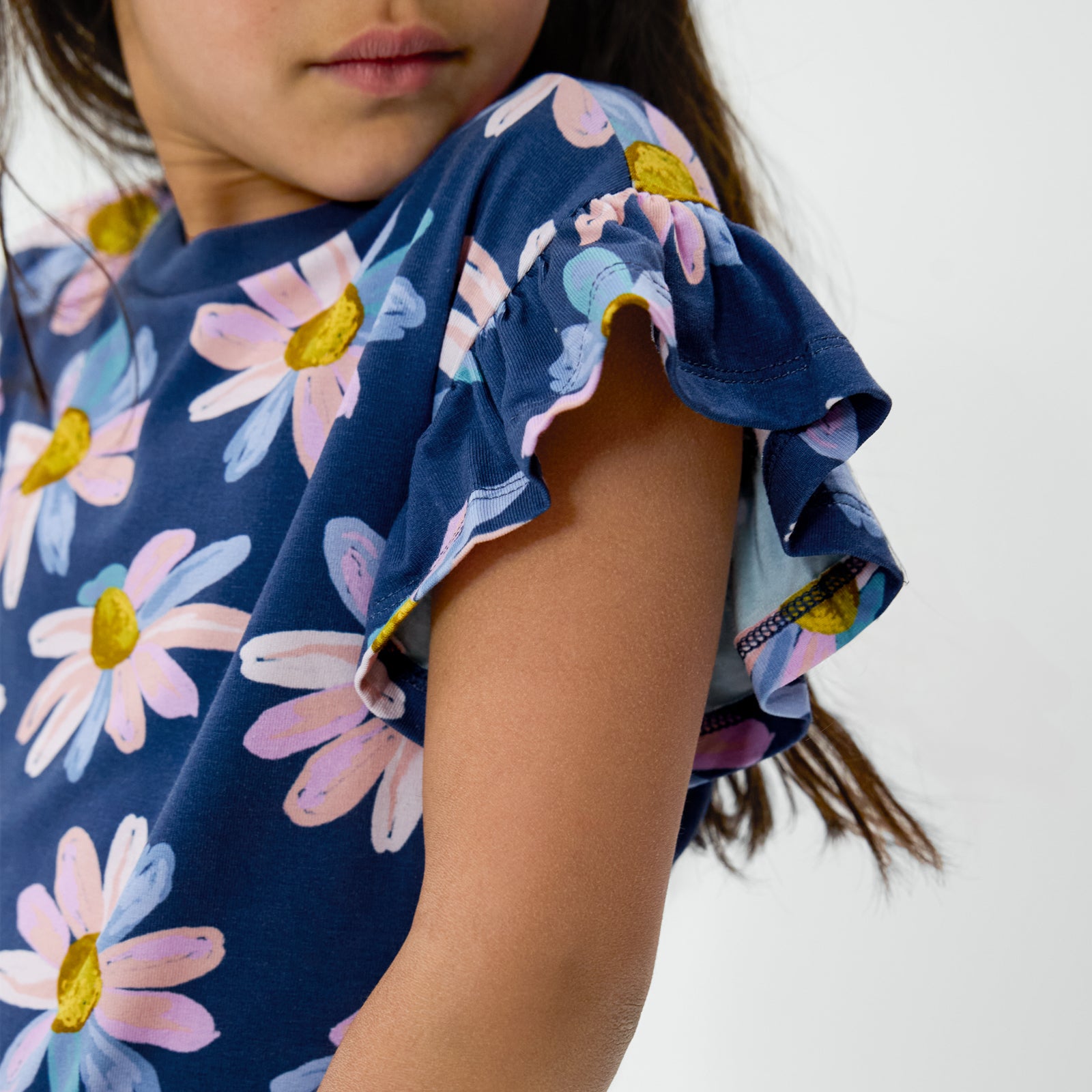 Close up of the sleeve detail on the Daisy Blooms Flutter Tee