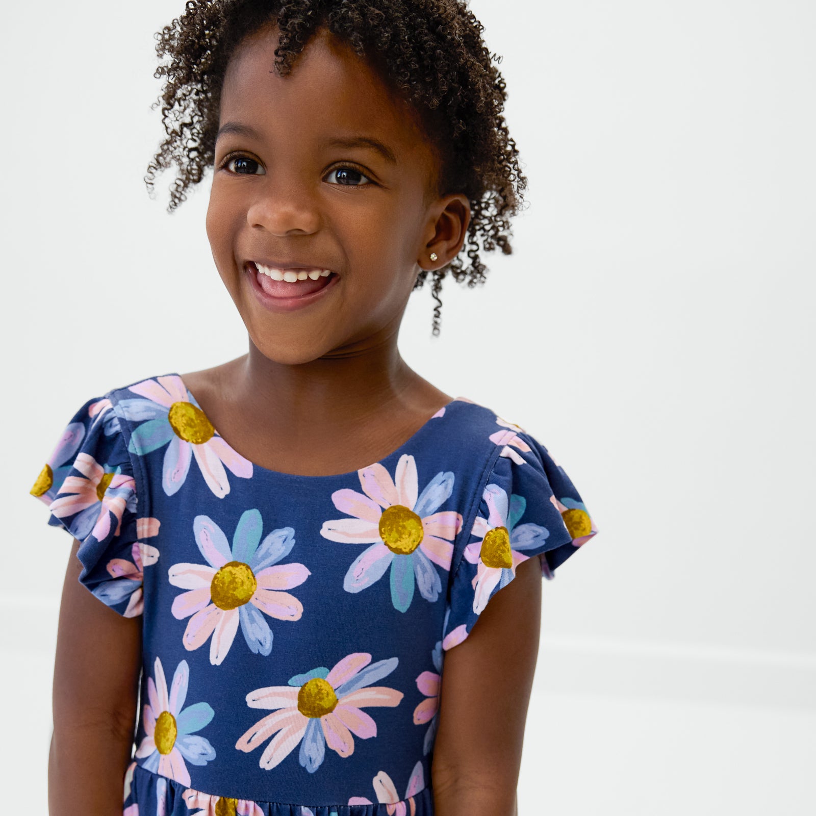 Close up of the bodice on the Daisy Blooms Flutter Twirl Dress