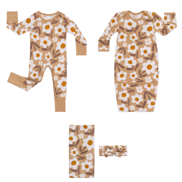 Flat lay composite of a Daisy Daydream crescent zippy, infant gown, and swaddle & luxe bow headband set