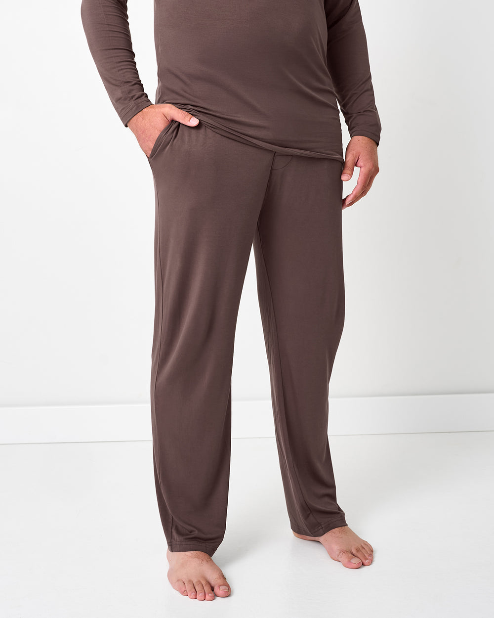 Man wearing the Dark Chocolate Men's Pajama Pants