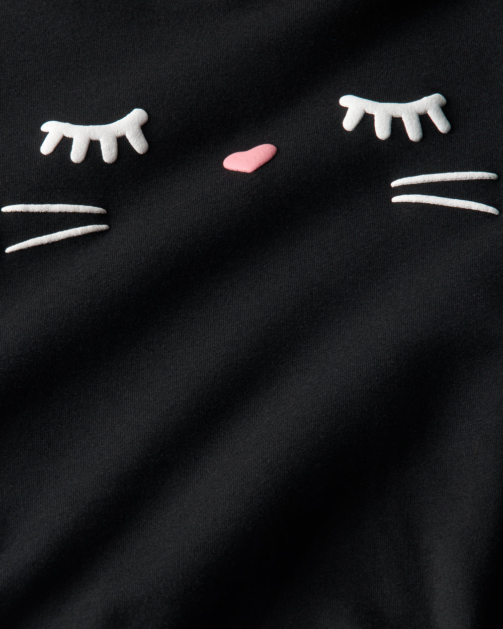 Close up of the cat details on the Black Cat Hoodie Romper