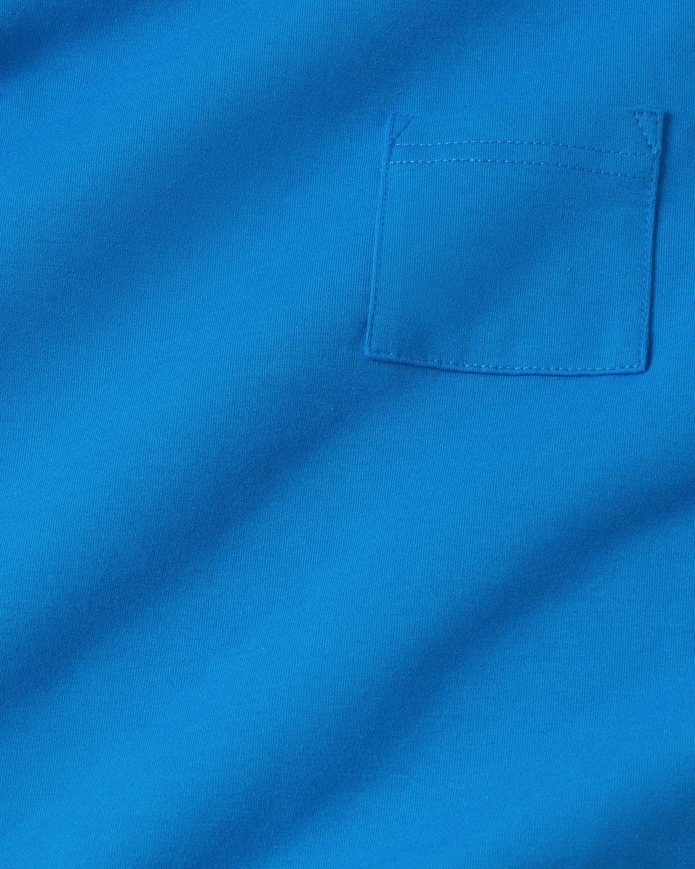 Close up flat lay of the Jay Blue Relaxed Pocket Tee