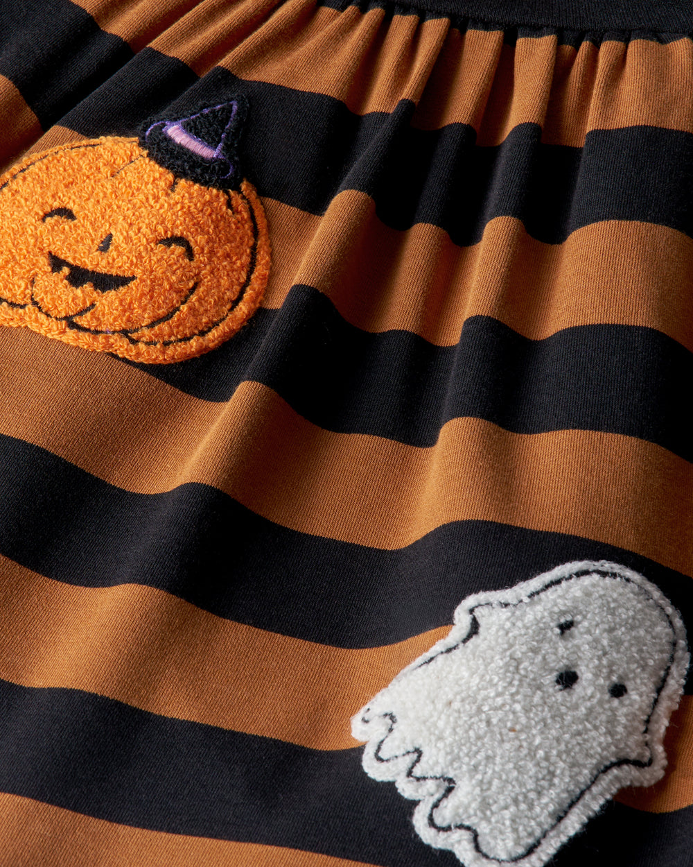 Close up of the graphic details on the Spooky Stripes Dress with Bloomer