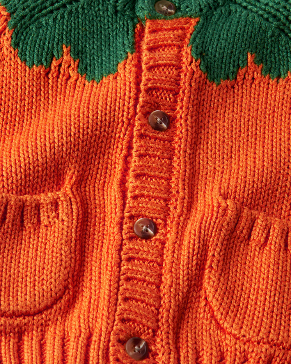 Close up of the button details on the Pumpkin Cardigan Sweater
