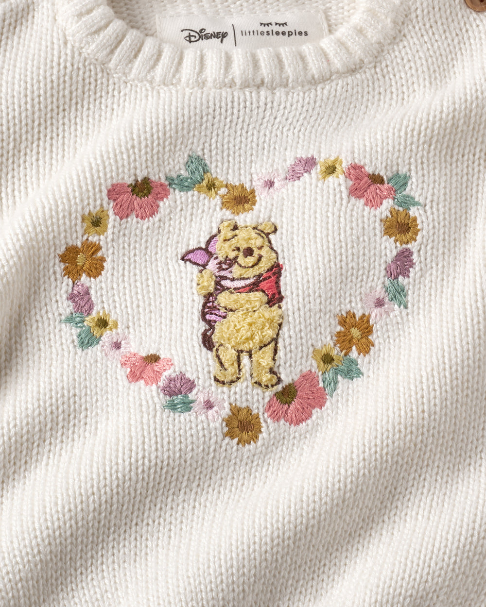Close up of the Winnie The Pooh newborn sweater
