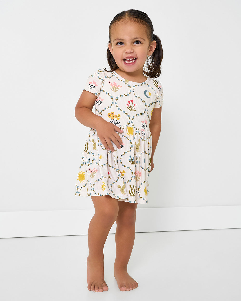 Toddler wearing the Desert Meadow Ribbed Skater Dress with Bodysuit