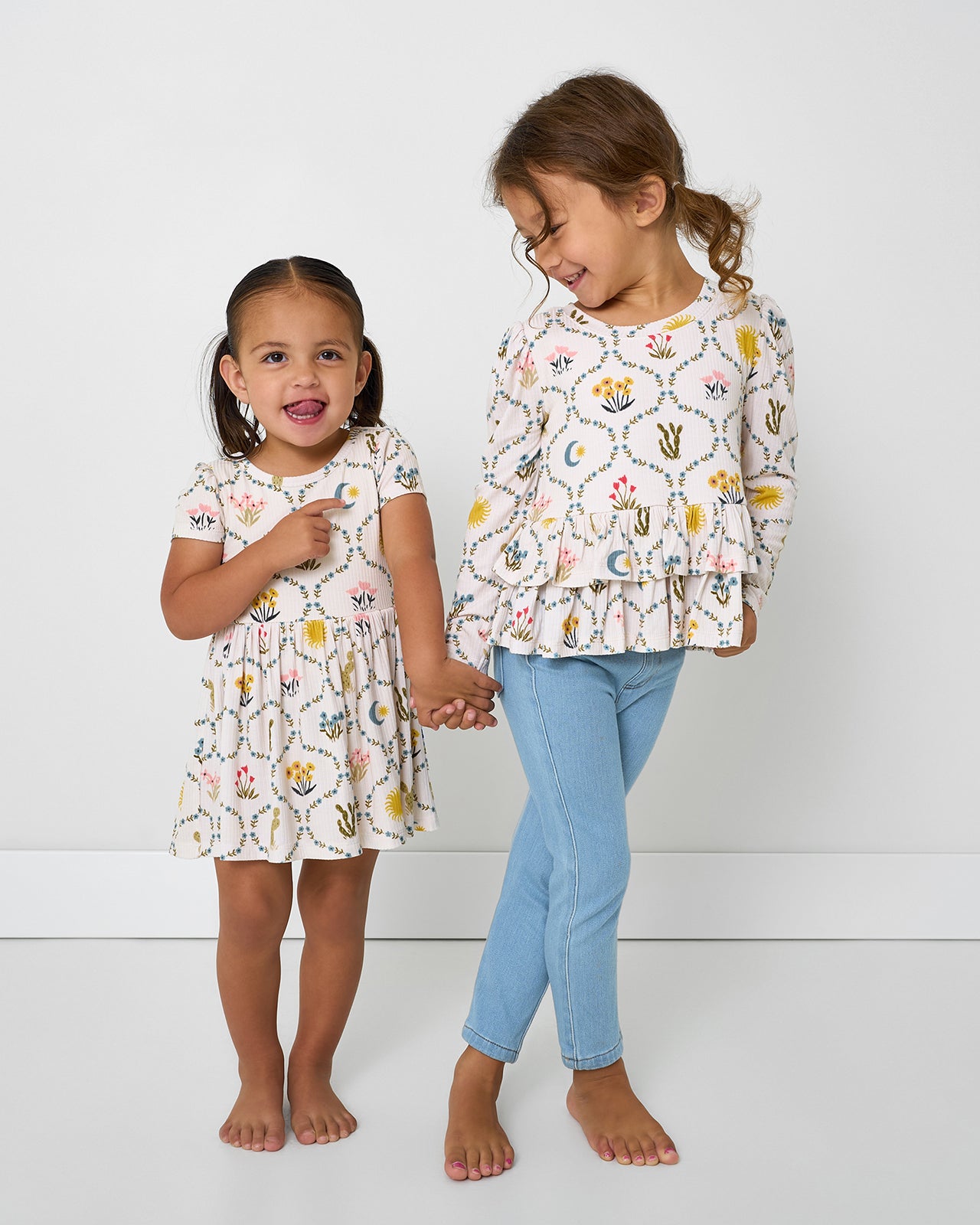 Two girls wearing matching Desert Meadow styles
