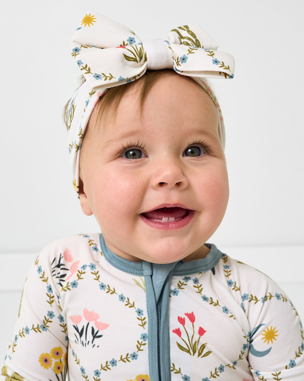 Sitting baby wearing the Desert Meadow Luxe Bow Headband