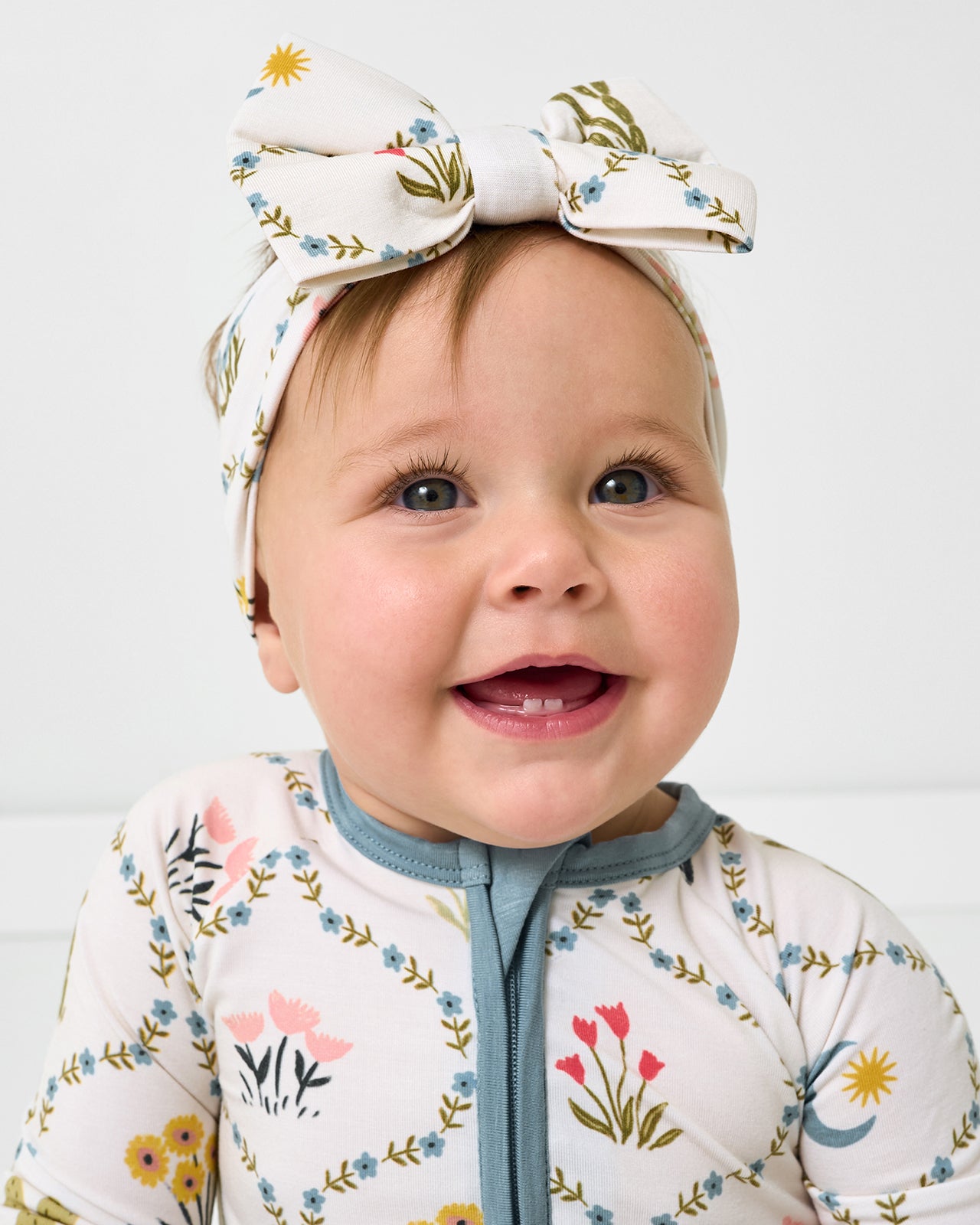 Sitting baby wearing the Desert Meadow Luxe Bow Headband