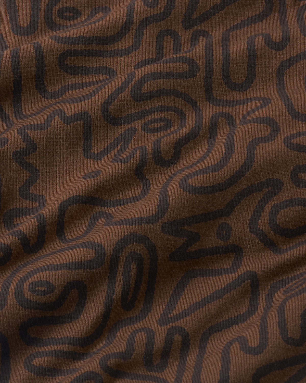 Close up of the Dino Maze fabric