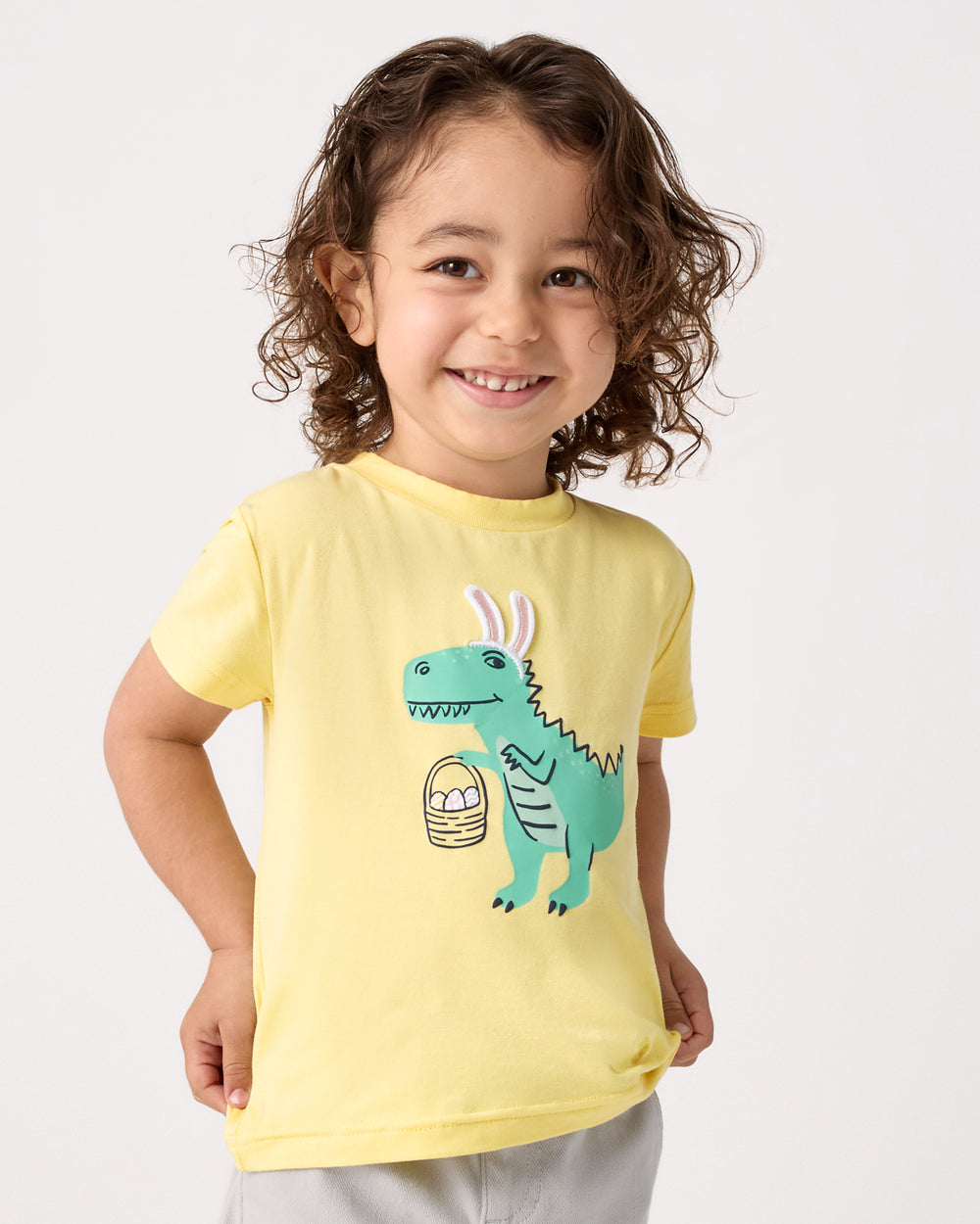 Boy wearing the Dino Egg Hunter Relaxed Tee
