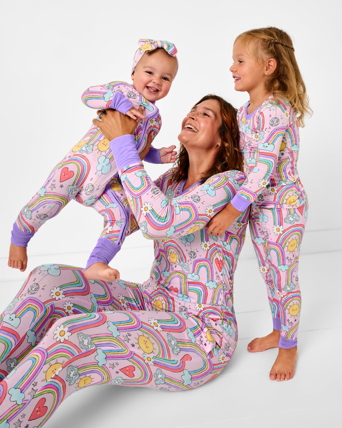 Alternate of mother and two children wearing matching Disco Rainbows bamboo Pajamas