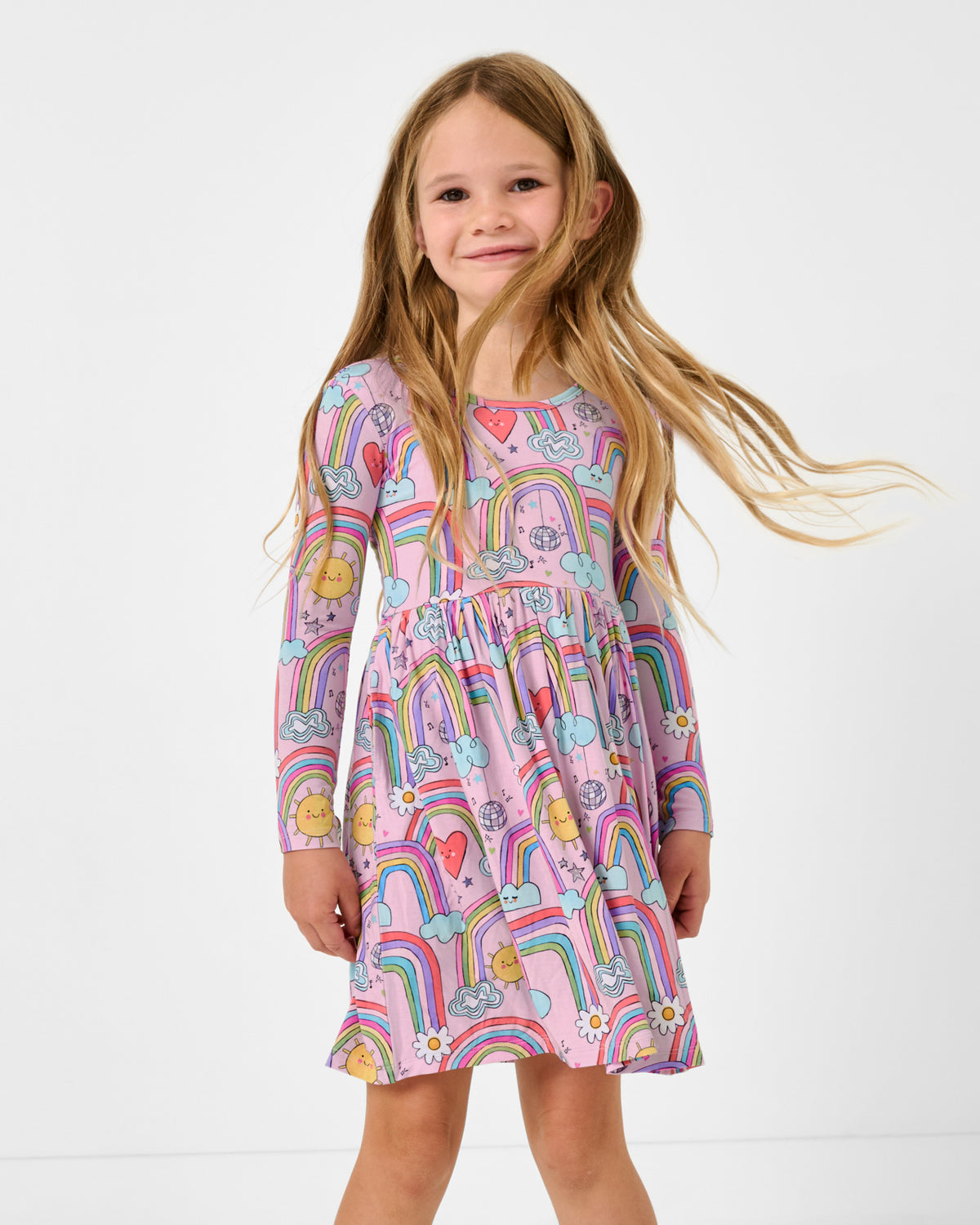 Close up of girl wearing the Disco Rainbows Skater Dress