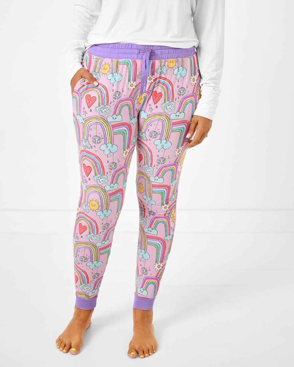 Woman wearing the Disco Rainbows Women's Pajama Pants