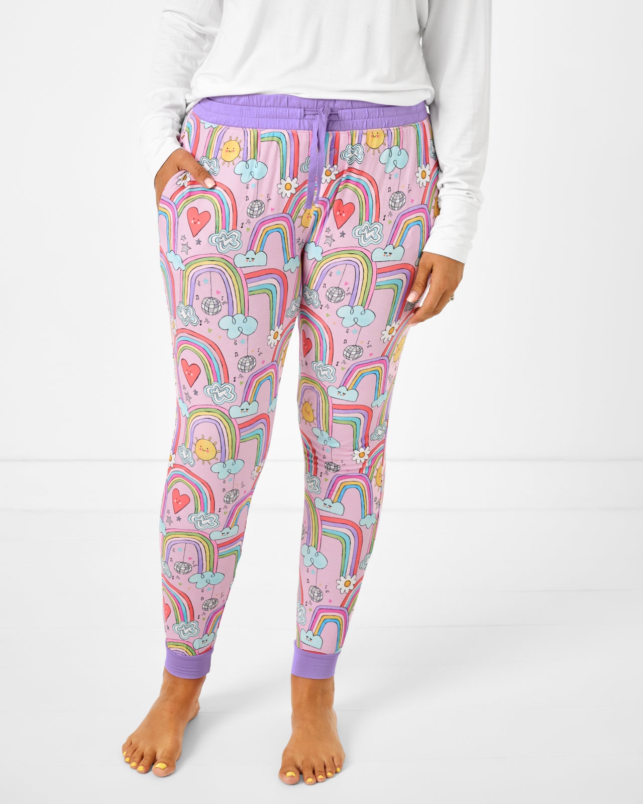 Woman wearing the Disco Rainbows Women's Pajama Pants