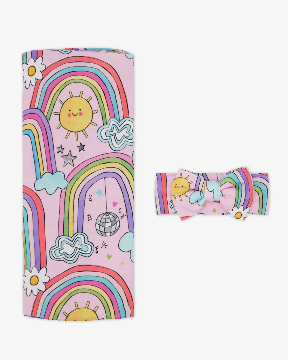 Flat lay of the Disco Rainbows Swaddle & Luxe Bow Headband Set