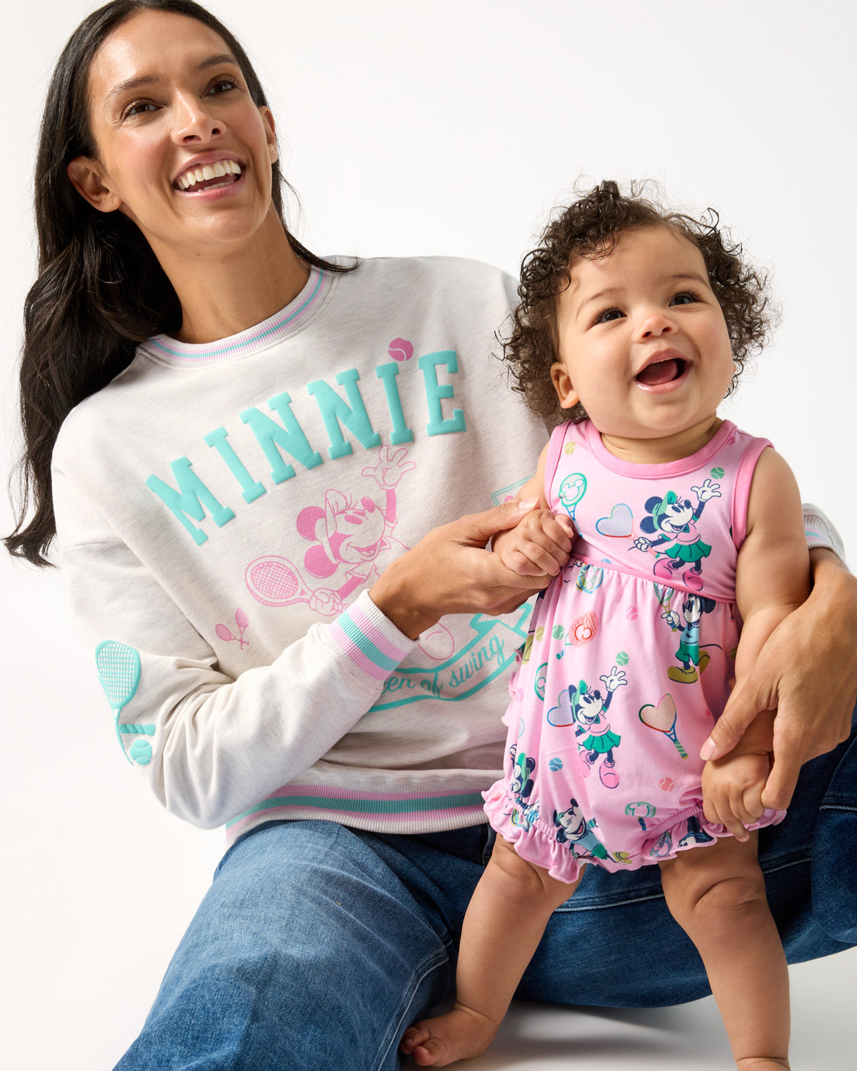 Mother and daughter wearing Disney  Minnie Mouse styles