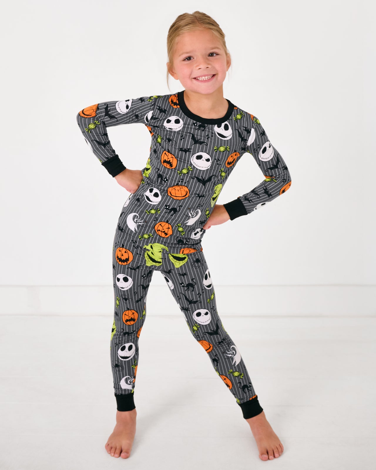 Posing girl wearing the Disney The Nightmare Before Christmas Two-Piece Pajama Set