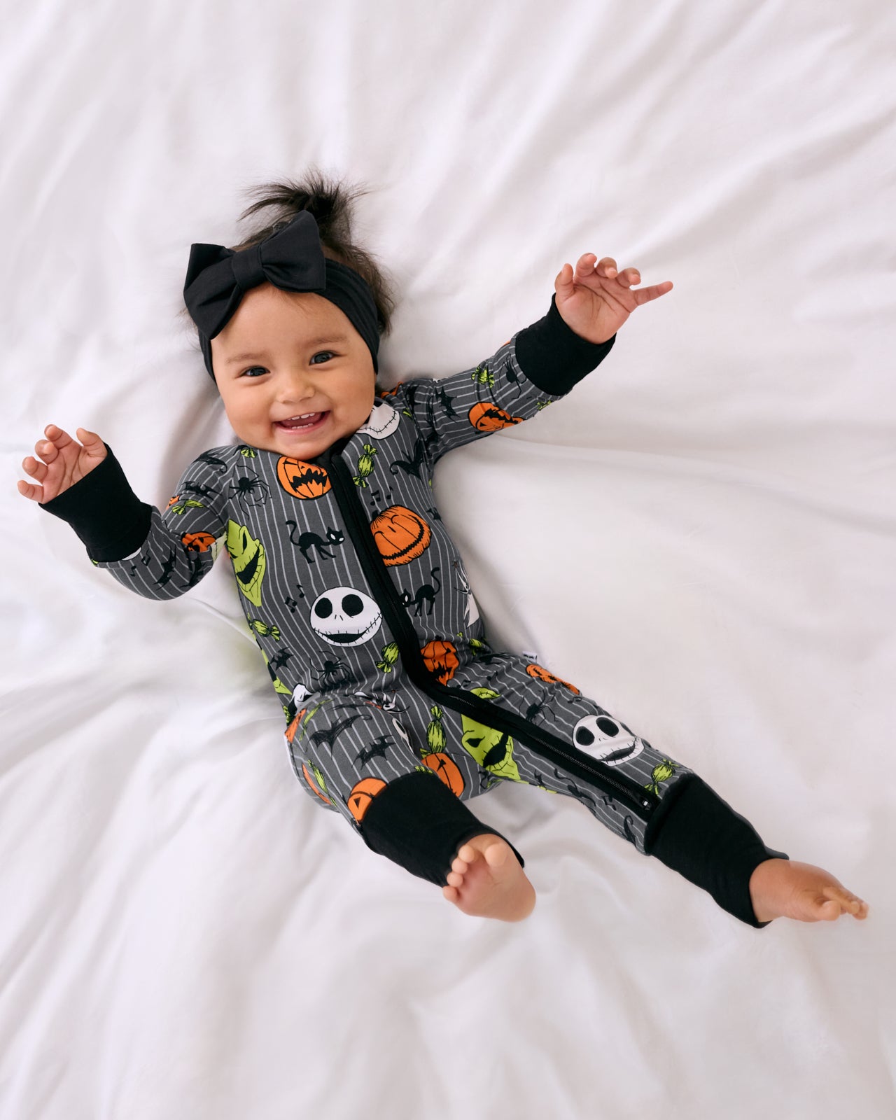 Aerial view of baby wearing the Disney The Nightmare Before Christmas Zippy