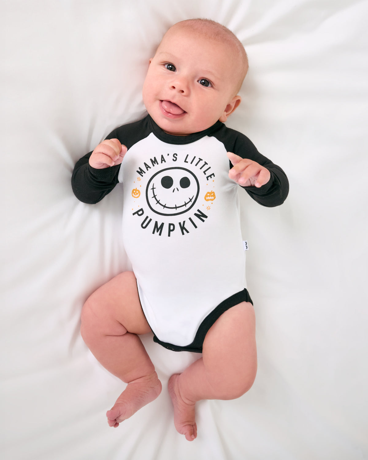 Alternate aerial view of baby wearing the Disney Mama's Little Pumpkin Raglan Bodysuit
