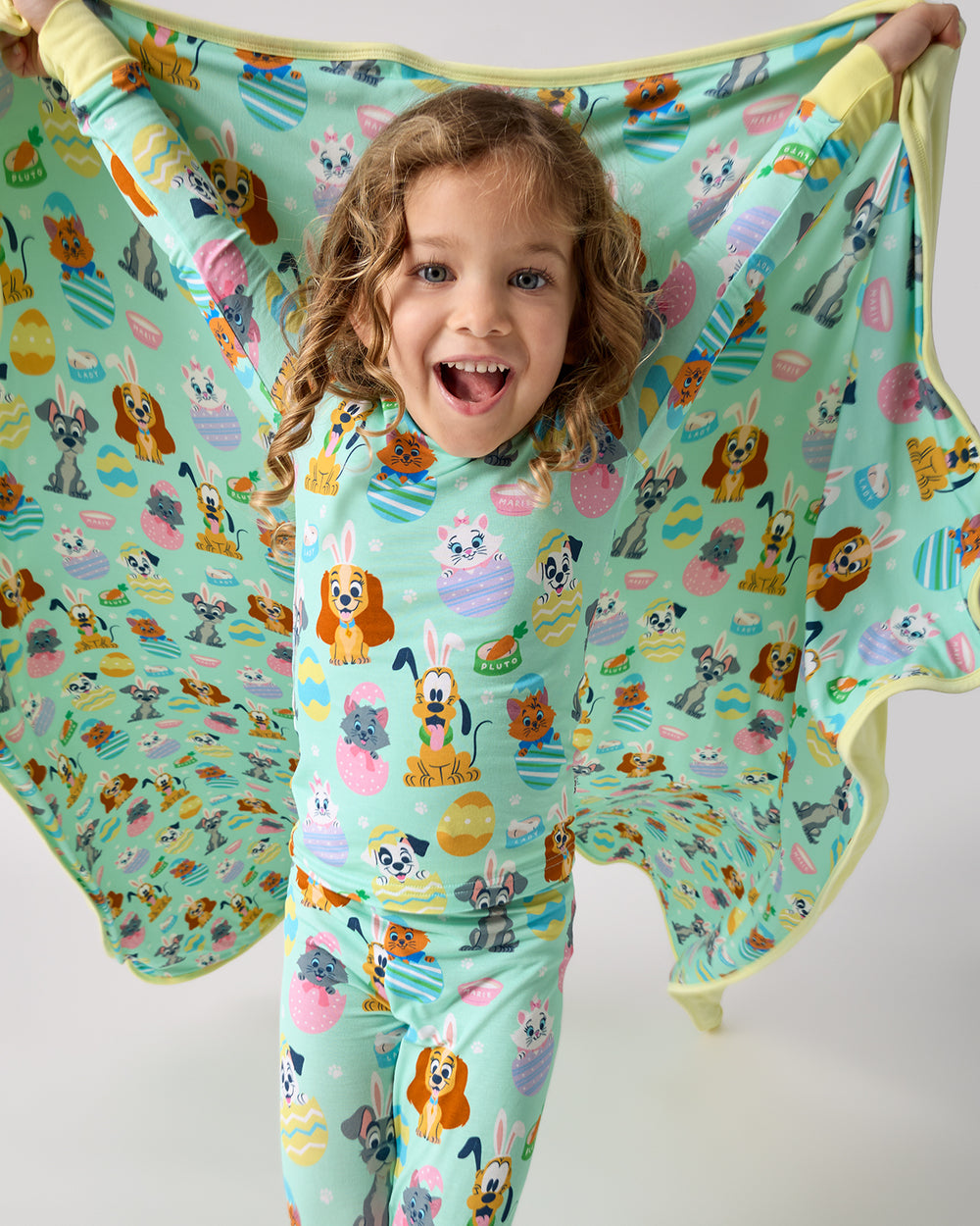 Child in motion holding the Disney Peekaboo Pets Large Cloud Blanket®