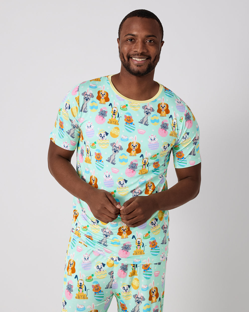 Man wearing the Disney Peekaboo Pets Men's Short Sleeve Pajama Top 