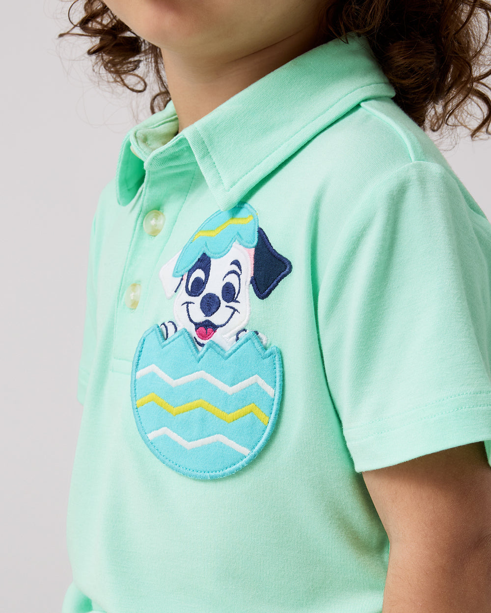 Close up of the embroidered detail on the Disney Peekaboo Pets Polo Shirt