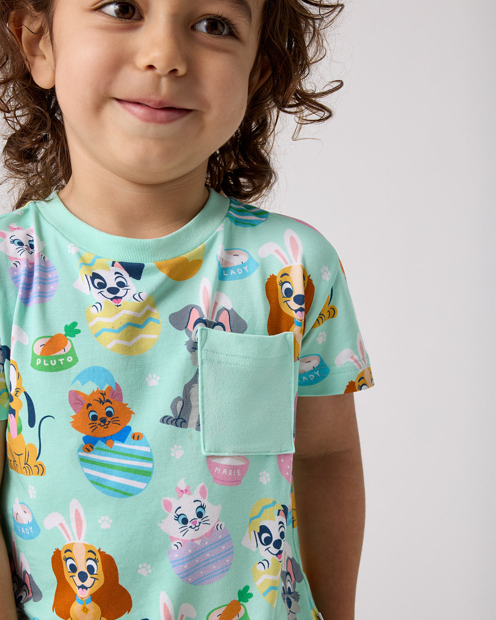 Close up of the pocket detail on the Disney Peekaboo Pets Relaxed Pocket Tee