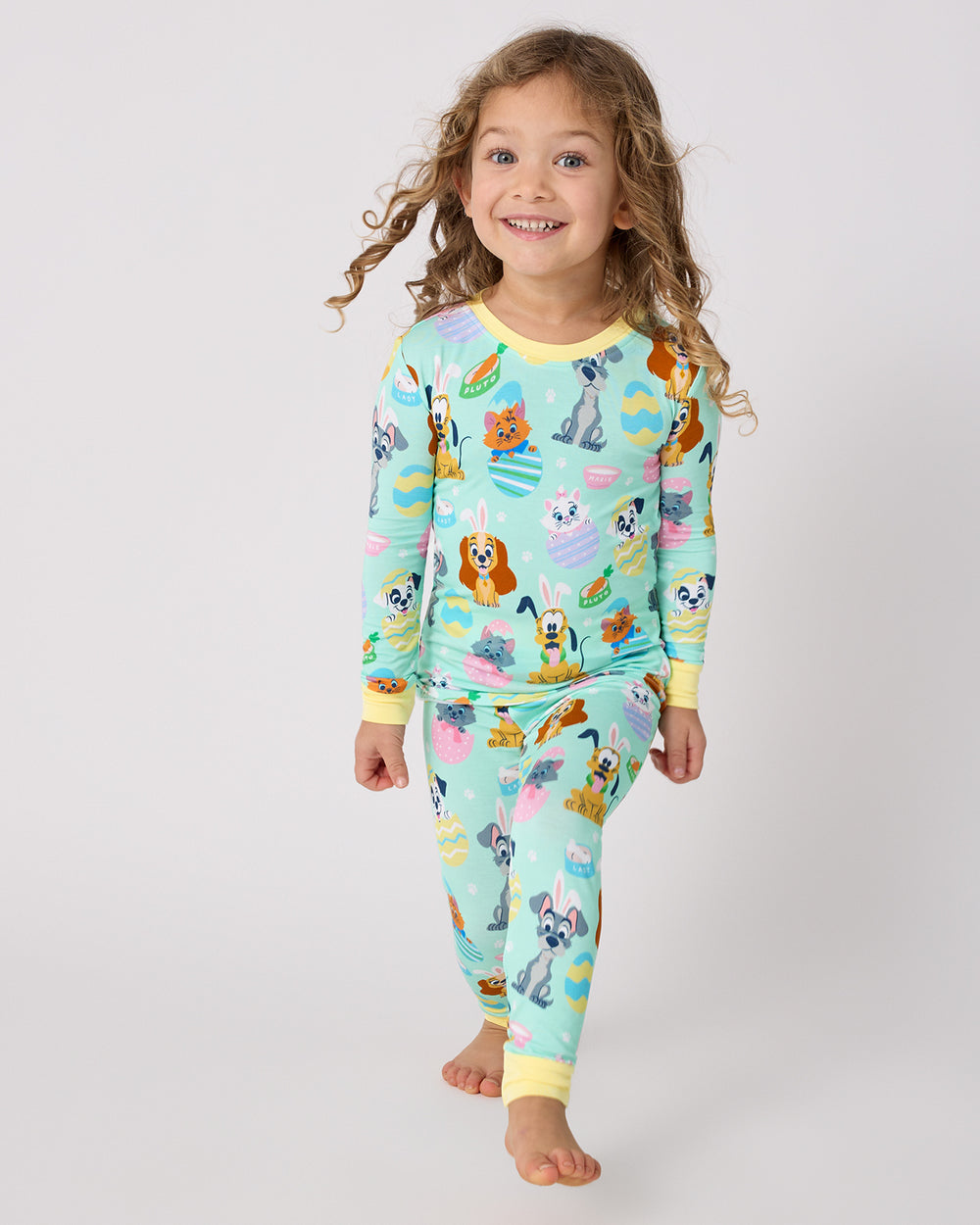Walking girl wearing the Disney Peekaboo Pets Two-Piece Pajama Set
