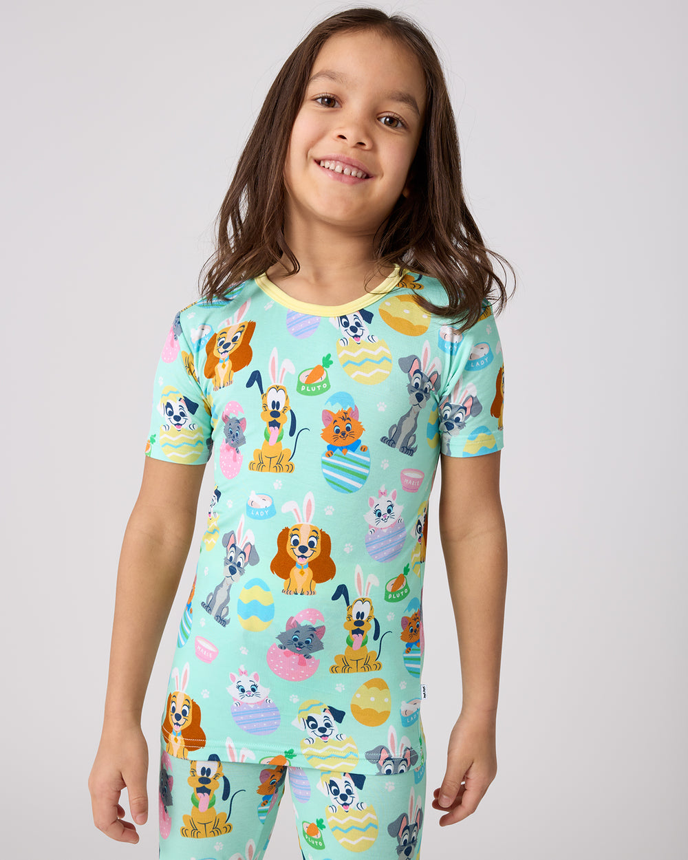 Close up of girl wearing the Disney Peekaboo Pets Two-Piece Short Sleeve Pajama Set