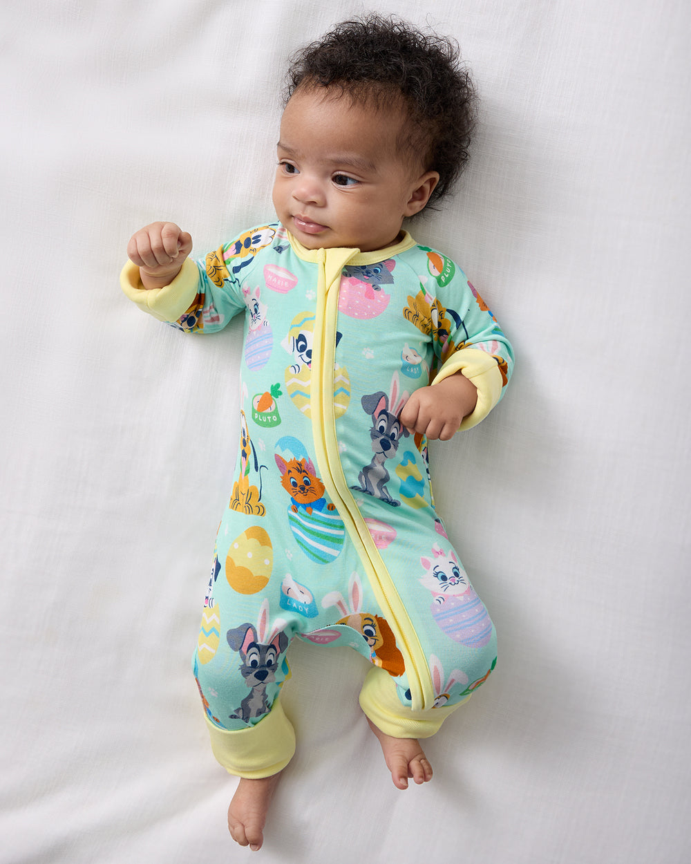 Aerial view of baby wearing the Disney Peekaboo Pets Zippy