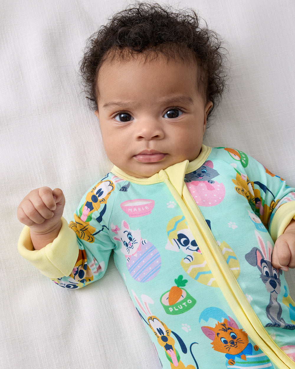 Close up of baby wearing the Disney Peekaboo Pets Zippy