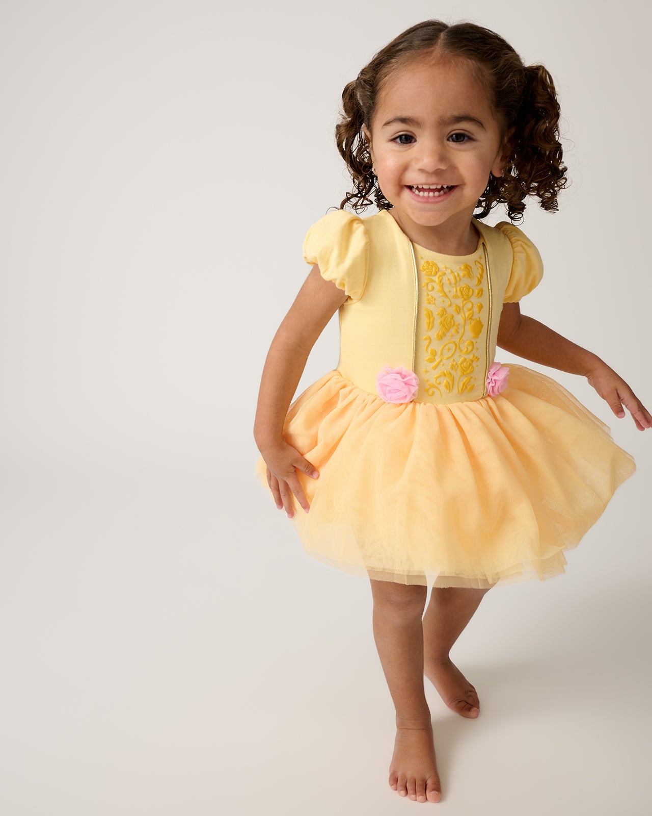 Walking toddler wearing the Disney Princess Belle Dress with Bodysuit
