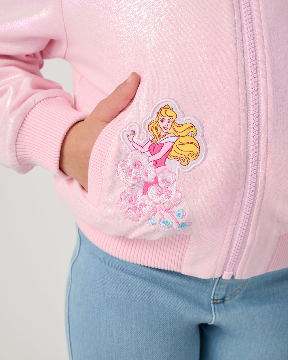 Close up of the pocket detail on the Disney Princess Iridescent Varsity Jacket