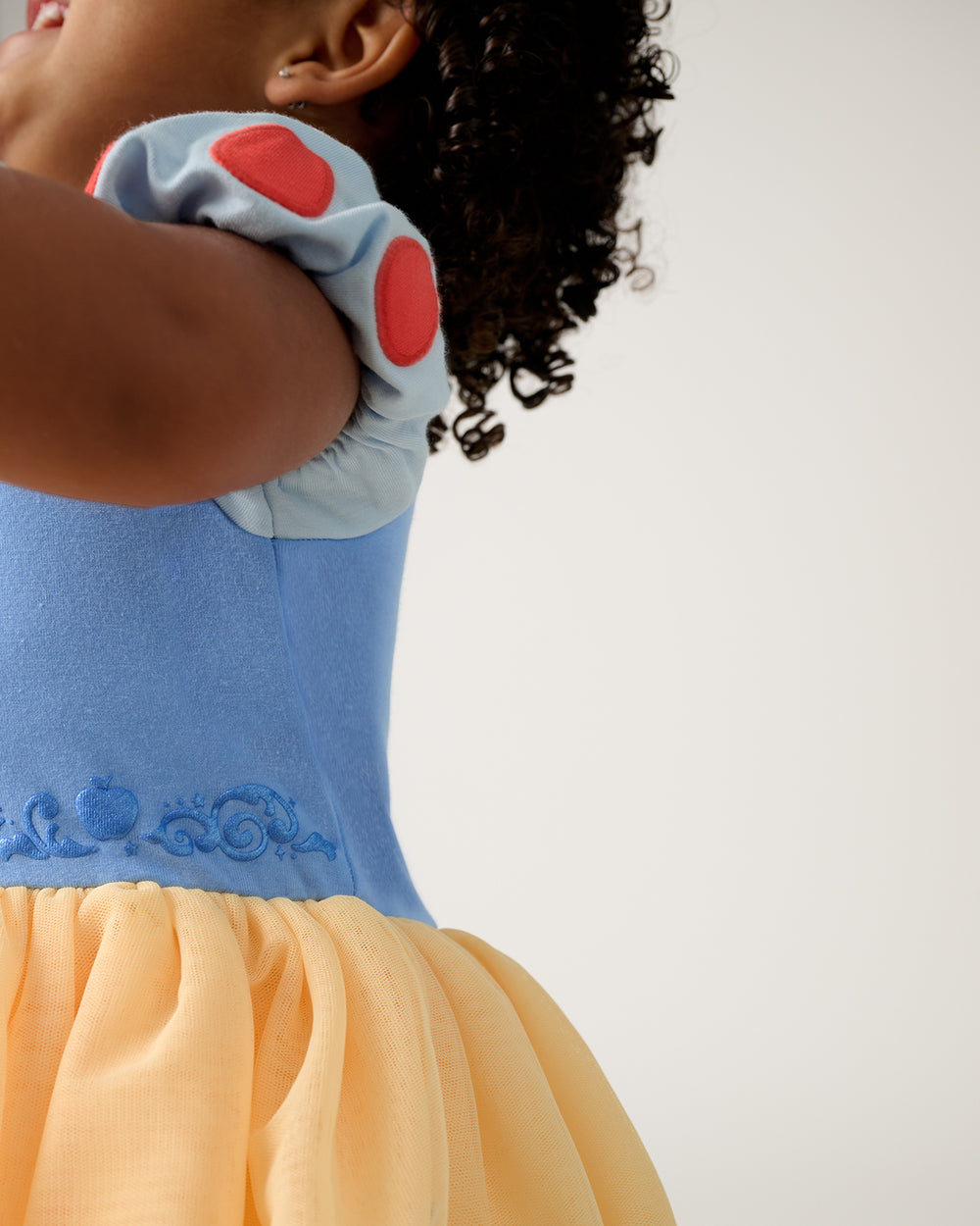 Close up of the puff sleeve detail on the Disney Princess Snow White Dress with Bodysuit