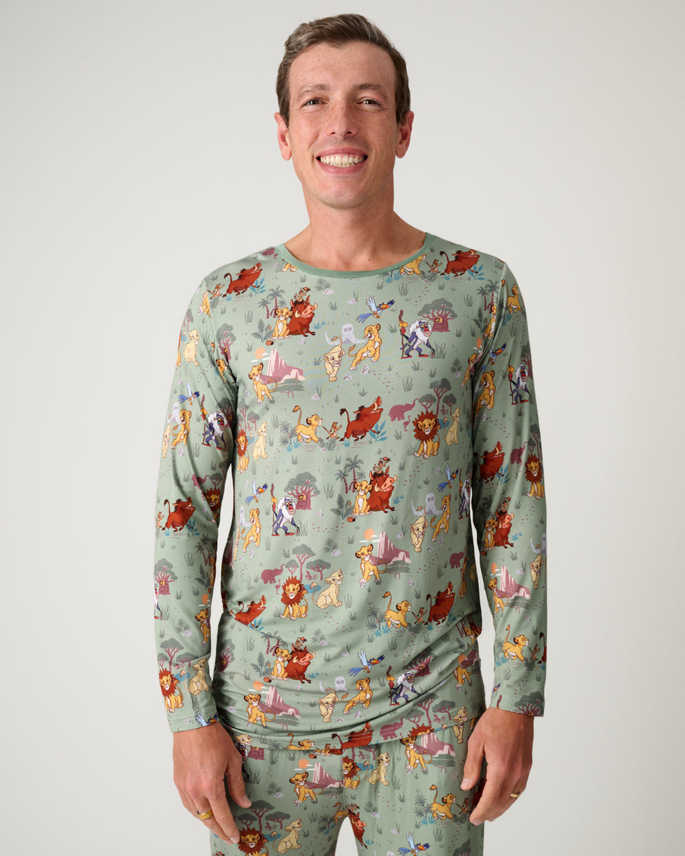 Man wearing the Disney Simba's Safari Men's Long Sleeve Pajama Top