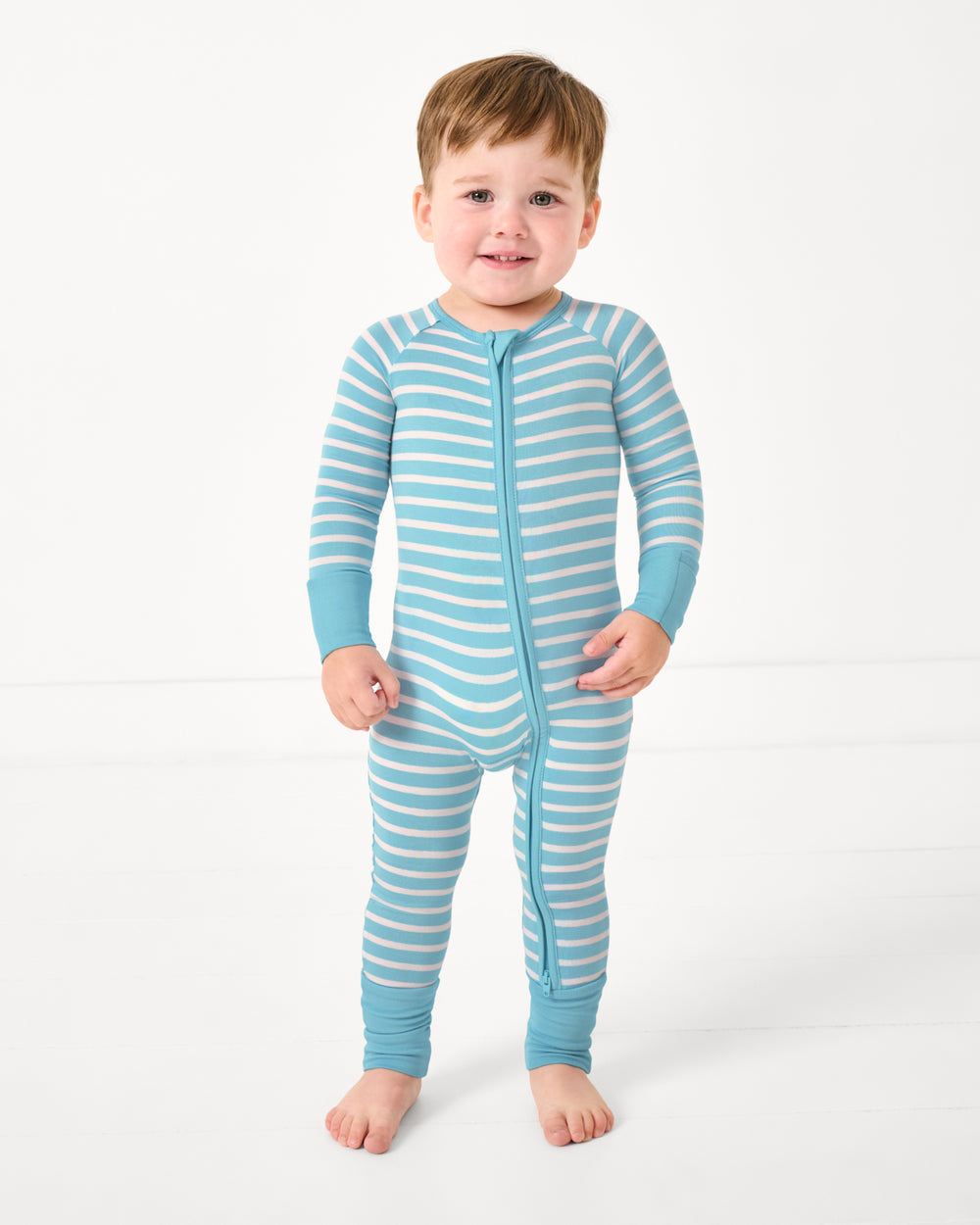Standing boy wearing the Dockside Stripe Zippy