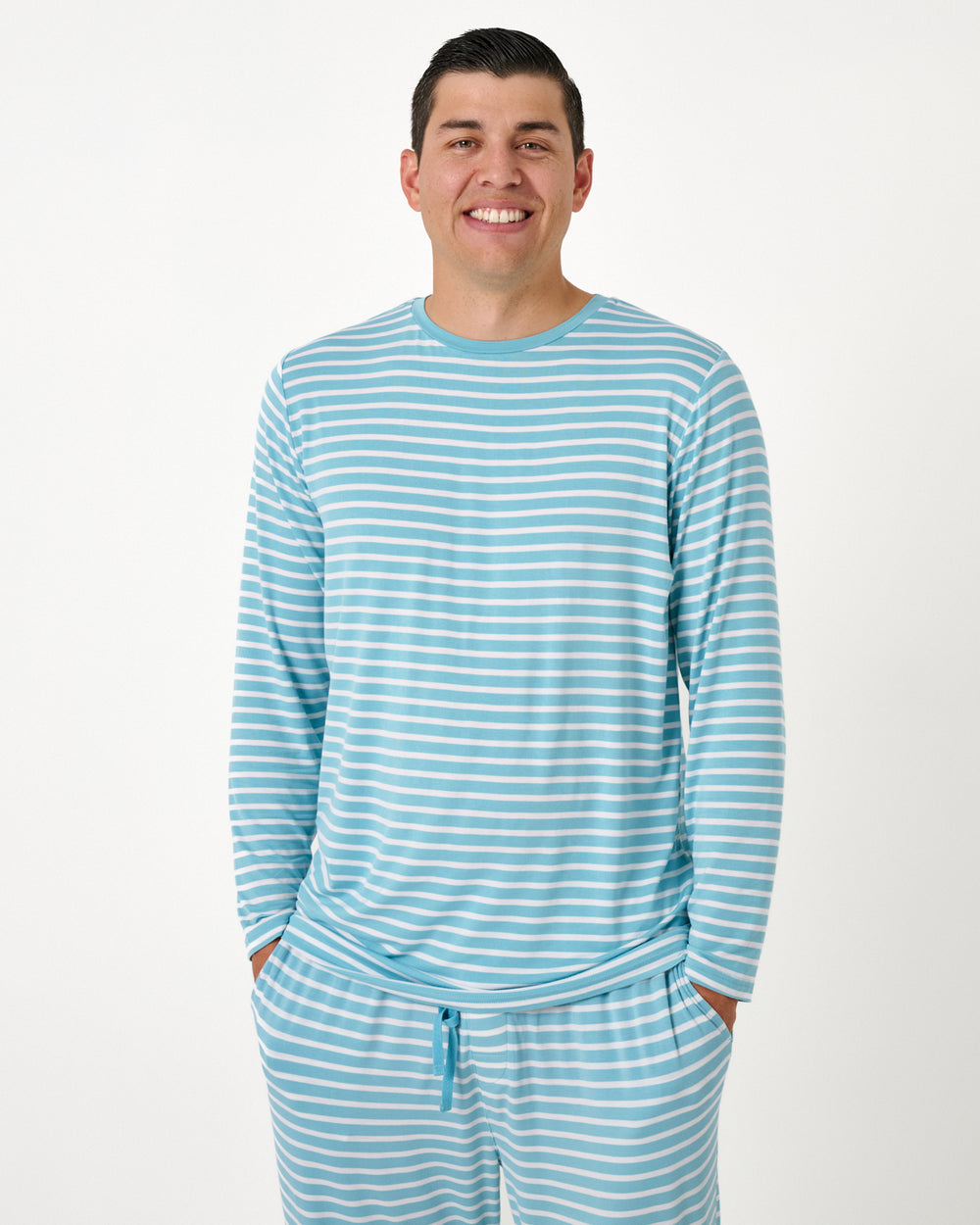 Close up of man wearing the Dockside Stripe Men's Long Sleeve Pajama Top