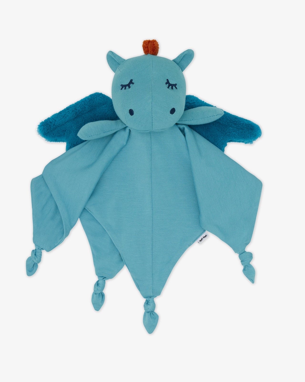 Flat lay of the Spark the Dragon Sleepyhead Lovey