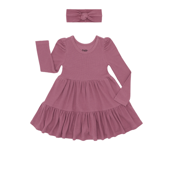 Flat lay composite of a Dusty Plum Waffle Tiered Dress and Knotted Headband