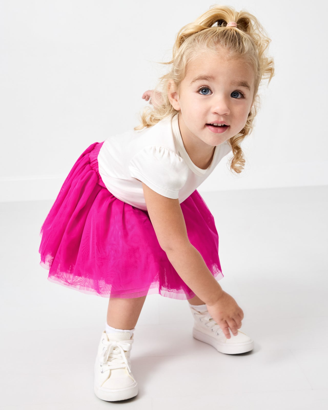 Close up of alternate girl wearing the Electric Fuchsia Tutu Skirt