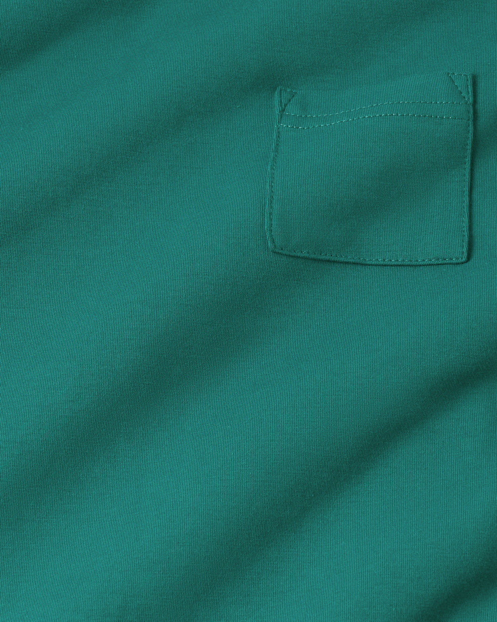 Close up of the pocket detail on the Emerald Isle Relaxed Pocket Tee