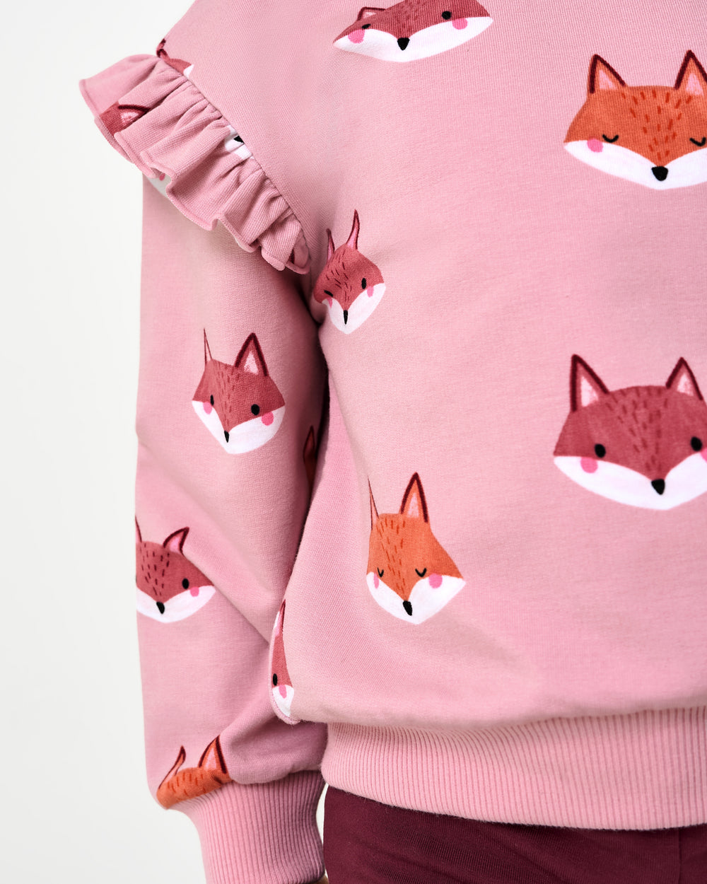 Close up of the flutter sleeve on the Fox Tracks Flutter Crewneck