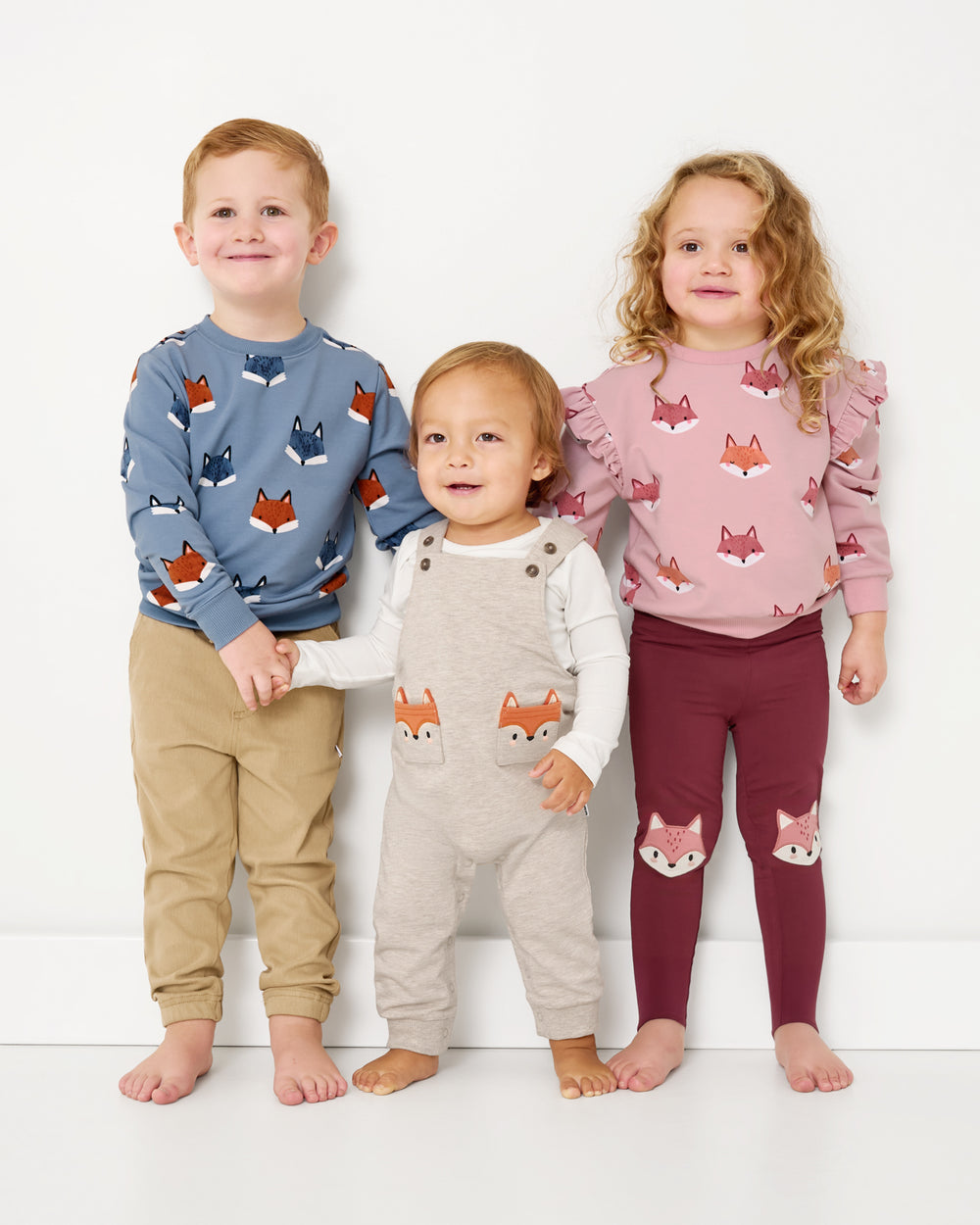 Three kids wearing matching Fox styles from the Autumn Collection