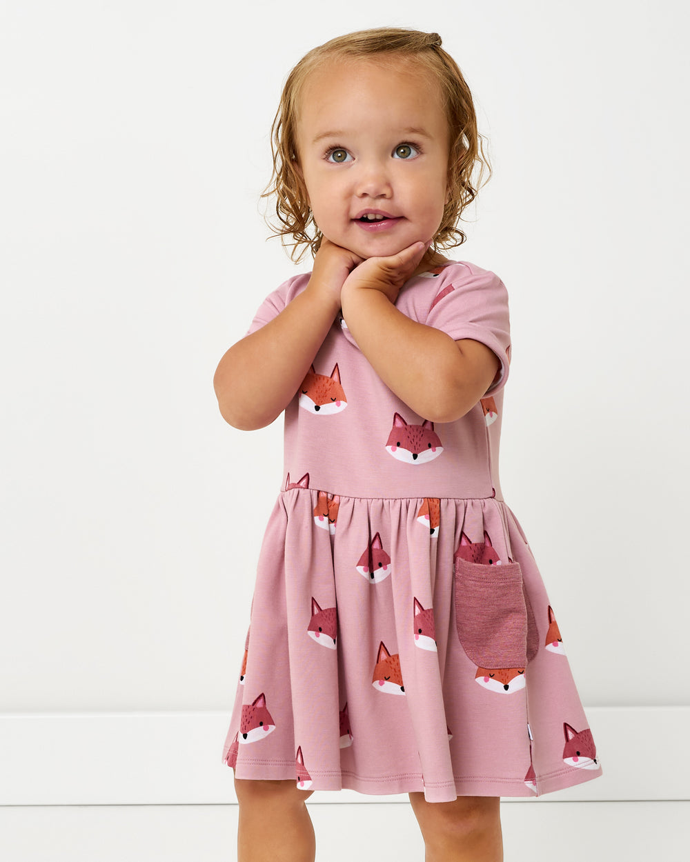 Baby wearing the Fox Tracks Patch Pocket Dress with Bloomer