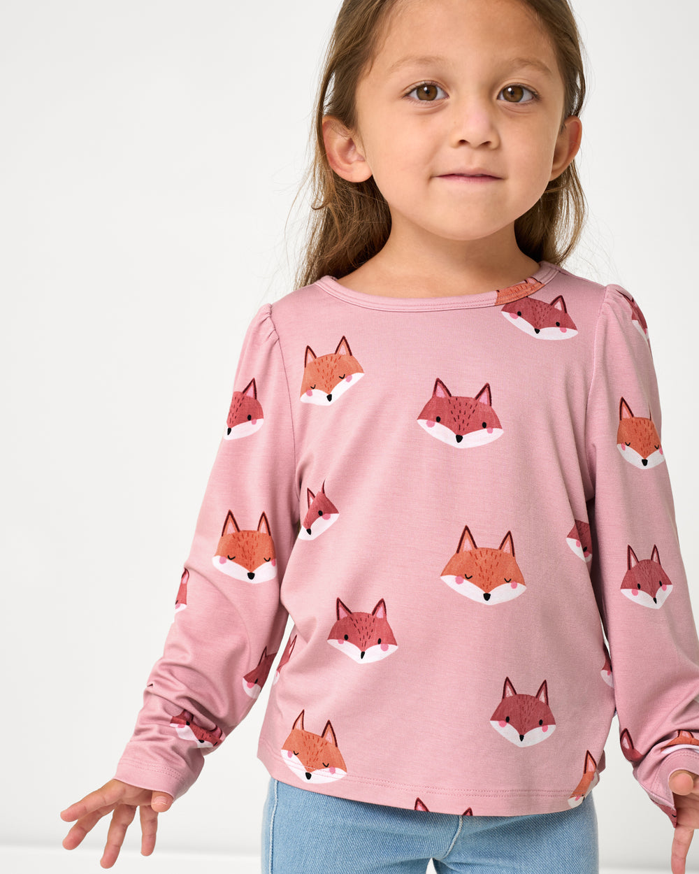 Girl wearing the Fox Tracks Puff Sleeve Tee