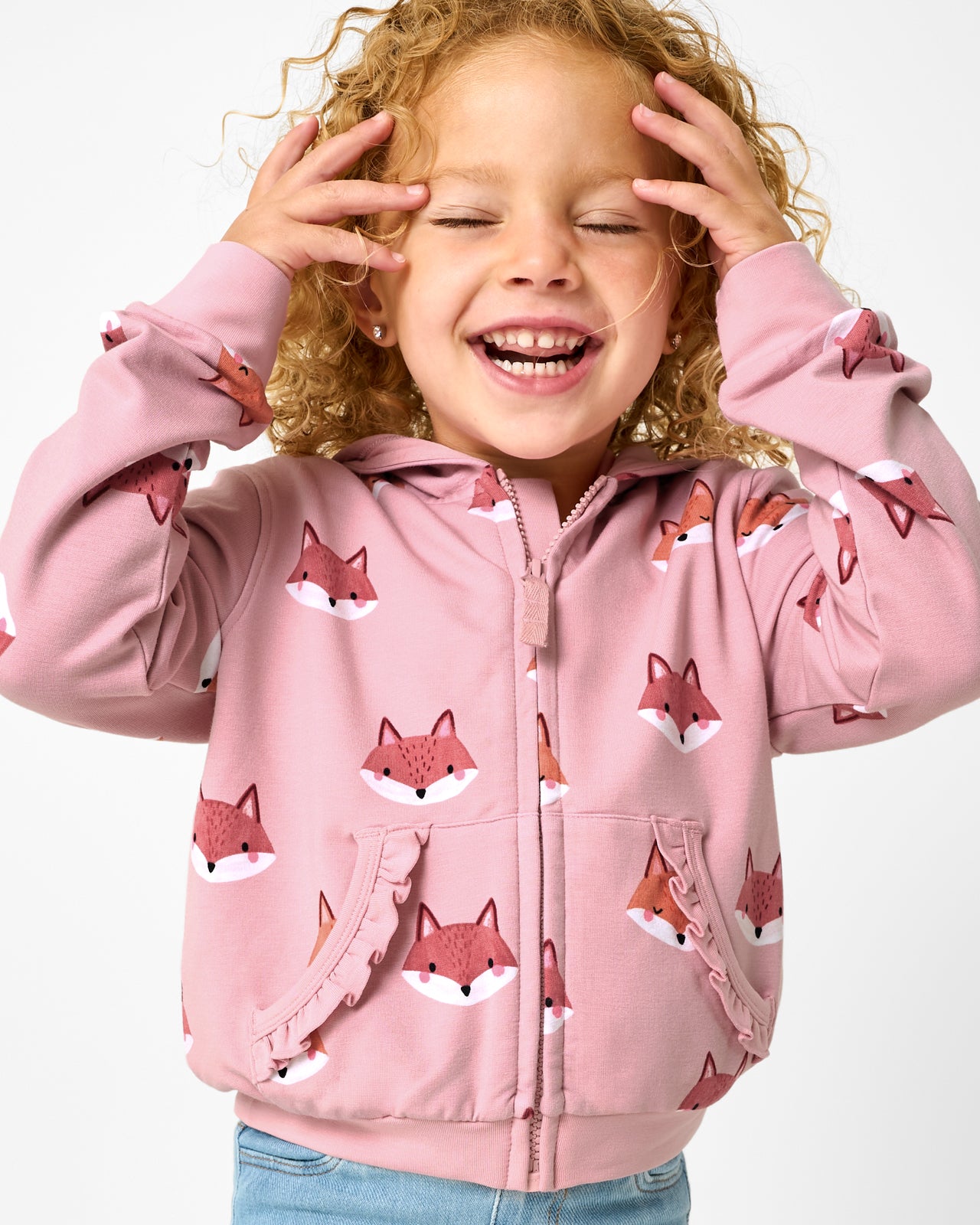 Posing girl wearing the Pink Fox Tracks Ruffle Zip Hoodie