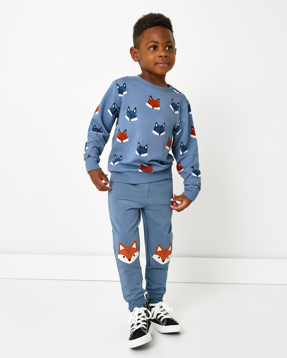 Boy wearing the Fox Tracks Crewneck Sweatshirt and coordinating jogger